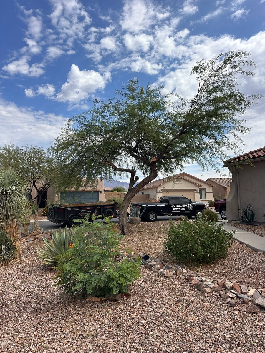 Southwest Sawyers truck and trailer on a maintenance visit at a residential property